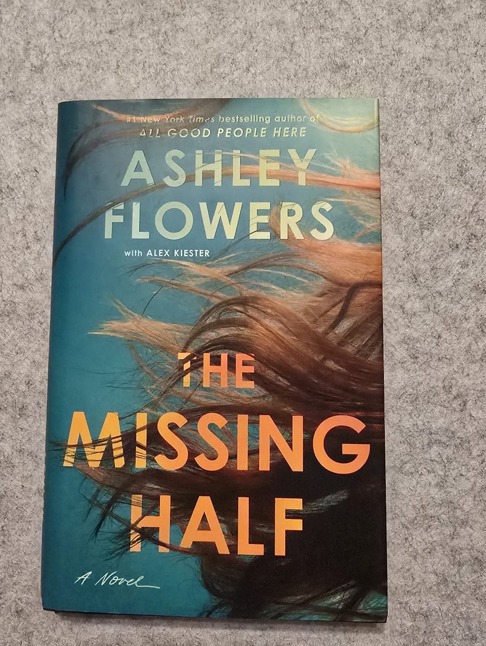 The Missing Half by Ashley Flowers Hardcover